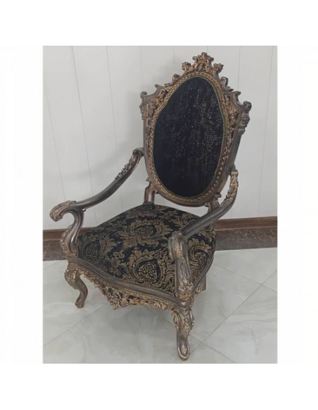 black wooden carved armchair