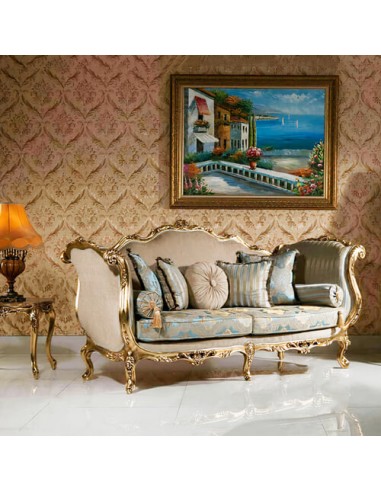 gold wooden camelback sofa