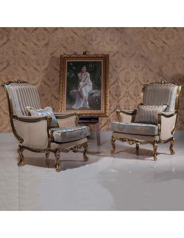 gold wooden camelback armchairs