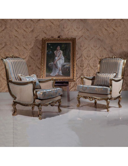 gold wooden camelback armchairs