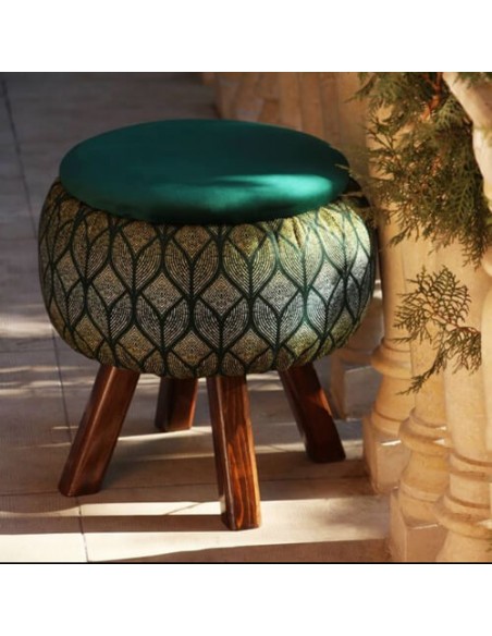 green ottoman with brown legs