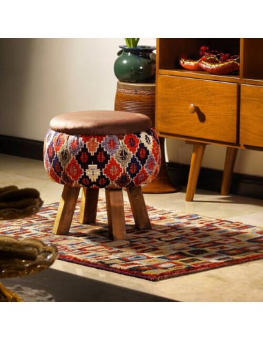 colorful ottoman with brown legs