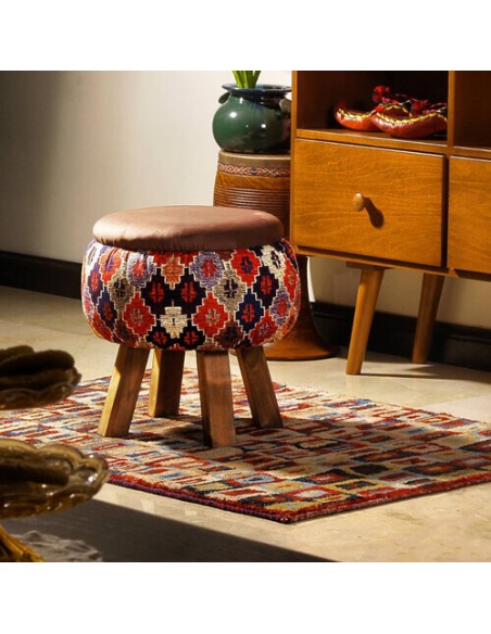 colorful ottoman with brown legs