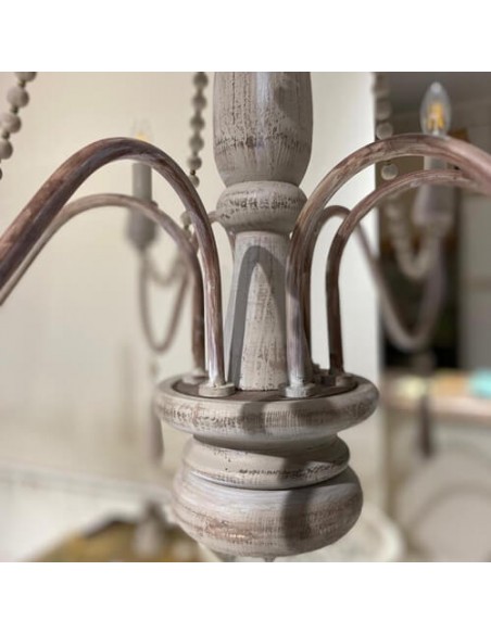 cream-neoclassical-woodcarving-and-metal-chandelier-details