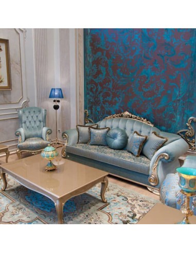 golden and blue wood frame sofa with coffee table