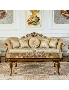 beige camelback wood frame sofa