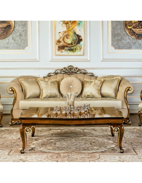 beige camelback wood frame sofa