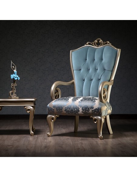 blue camelback wood frame armchair