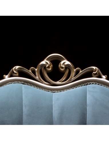 blue camelback wood frame armchair - details