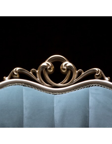 blue camelback wood frame armchair - details