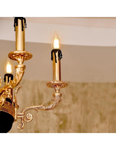 Golden Chandelier with Angle Sculpture - details Golden Chandelier with Angle Sculpture - details