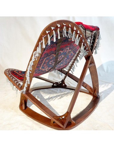unique chair with handwoven rug - backward