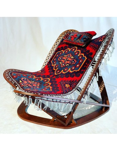 unique chair with handwoven rug