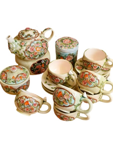 tea set with embossed motifs