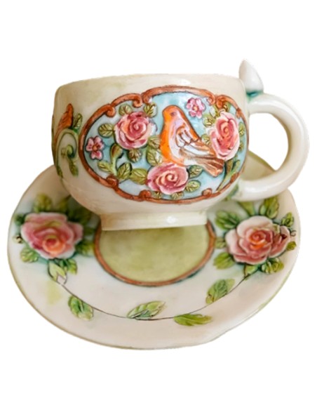 teacup with embossed motifs