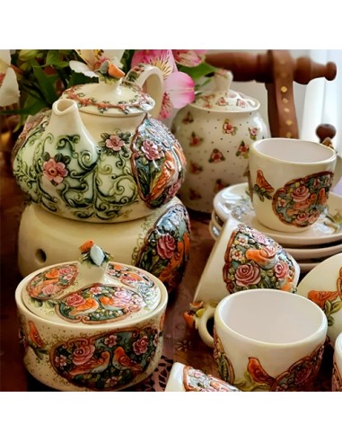 handmade tea set embossed motifs