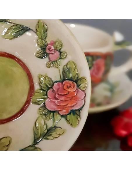 saucer with embossed motifs