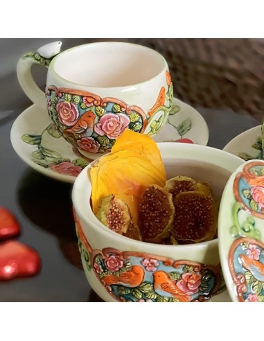 tea cup set with embossed motifs