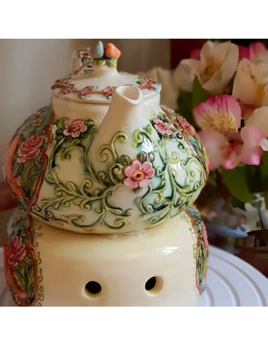 handmade teapot with embossed motifs