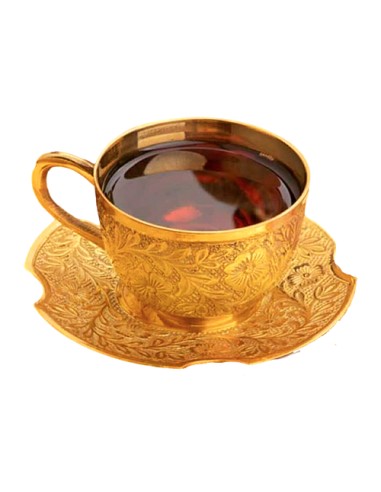 brass tea cup and saucer