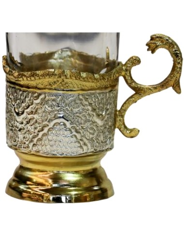 toreutics tea cup golden and silver details