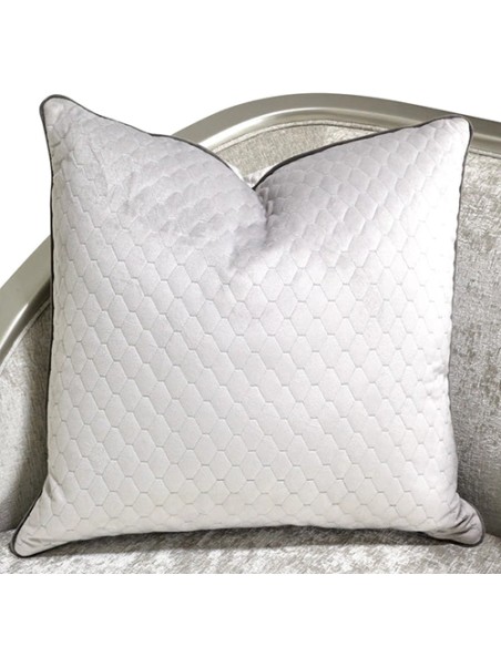 modern sofa in silver with accent pillows