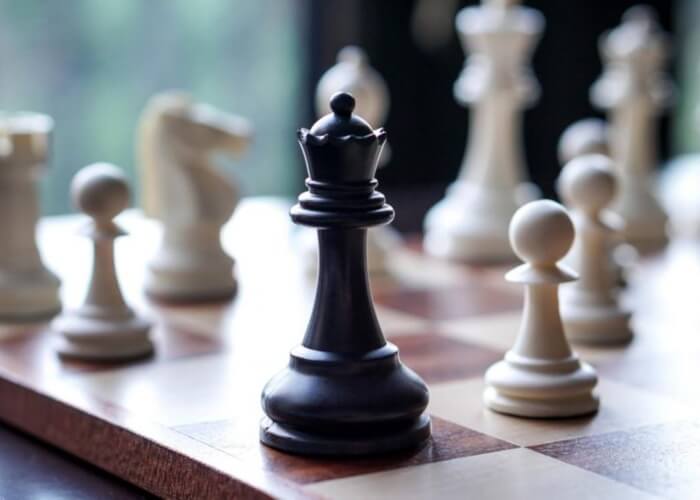 queen and bishop in a chess board