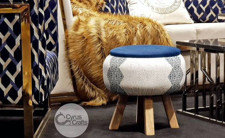 blue-ottoman-with-ivory-legs